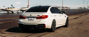 Preview wallpaper bmw m5, bmw, car, white, airport