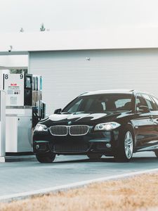 Preview wallpaper bmw series 5, bmw, fuel station