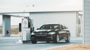 Preview wallpaper bmw series 5, bmw, fuel station