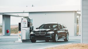 Preview wallpaper bmw series 5, bmw, fuel station