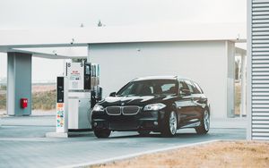 Preview wallpaper bmw series 5, bmw, fuel station