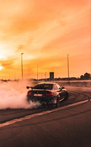 Preview wallpaper bmw, speed, drift, smoke, sunset