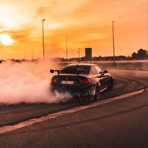 Preview wallpaper bmw, speed, drift, smoke, sunset