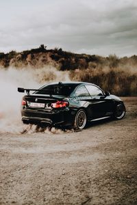 Preview wallpaper bmw, spoiler, car, black, dust