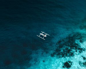 Preview wallpaper boat, aerial view, sea, stones, water