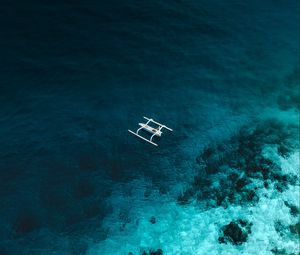 Preview wallpaper boat, aerial view, sea, stones, water