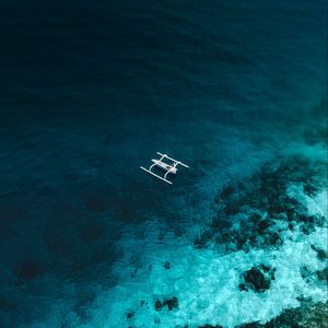 Preview wallpaper boat, aerial view, sea, stones, water