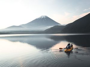 Preview wallpaper boat, canoe, volcano, sea, ripples