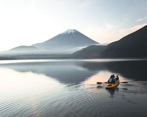 Preview wallpaper boat, canoe, volcano, sea, ripples