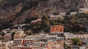 Preview wallpaper boat, city, buildings, coast, rocks, sea