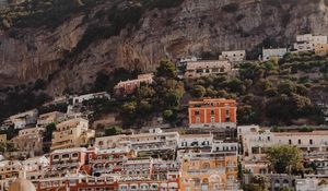 Preview wallpaper boat, city, buildings, coast, rocks, sea