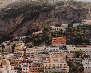 Preview wallpaper boat, city, buildings, coast, rocks, sea