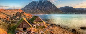 Preview wallpaper boat, coast, lodges, constructions, mountains, lake, purity