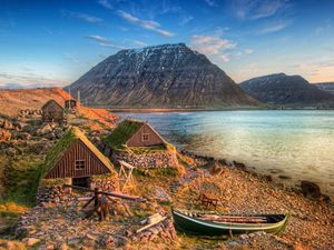 Preview wallpaper boat, coast, lodges, constructions, mountains, lake, purity