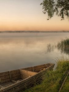 Preview wallpaper boat, coast, mooring, bench, grass, fog, evening