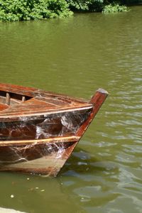 Preview wallpaper boat, coast, oars, water, reflections, solarly