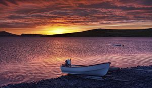 Preview wallpaper boat, coast, romanticism, mountain, decline, ripples