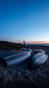 Preview wallpaper boat, coast, sand, sea, dusk