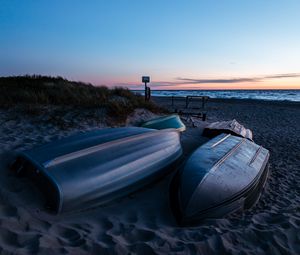 Preview wallpaper boat, coast, sand, sea, dusk