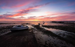 Preview wallpaper boat, coast, sea, sunrise