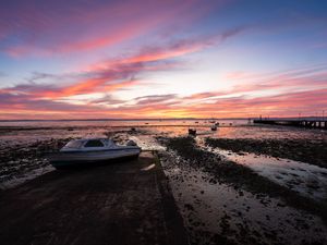 Preview wallpaper boat, coast, sea, sunrise