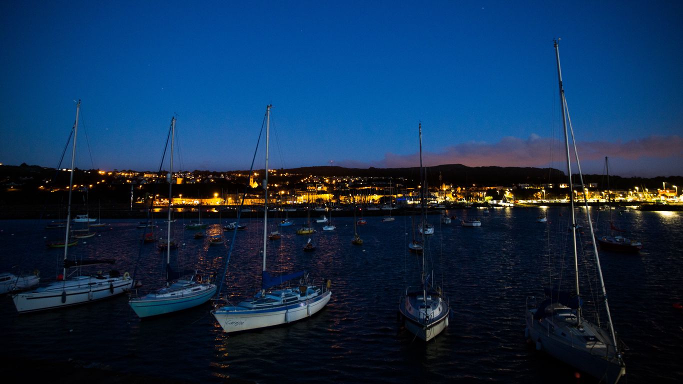 Download wallpaper 1366x768 boat, dock, night, sea tablet, laptop hd