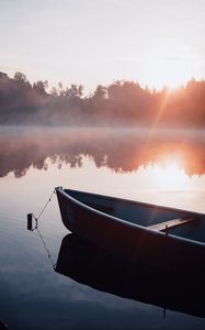 Preview wallpaper boat, fog, rays, water