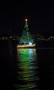Preview wallpaper boat, garland, christmas tree, river, night, new year, christmas