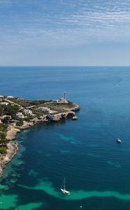 Preview wallpaper boat, island, sea, lighthouse, houses