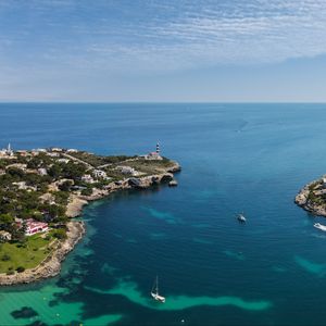 Preview wallpaper boat, island, sea, lighthouse, houses