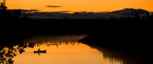 Preview wallpaper boat, lake, bushes, sunset, silhouette