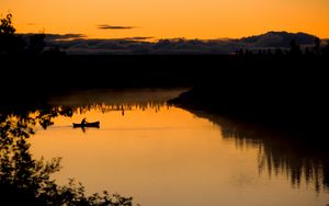 Preview wallpaper boat, lake, bushes, sunset, silhouette