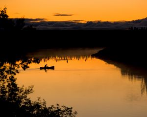 Preview wallpaper boat, lake, bushes, sunset, silhouette