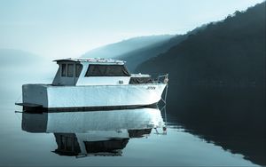 Preview wallpaper boat, lake, fog, water, reflection