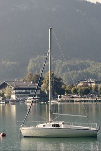 Preview wallpaper boat, lake, houses, village, mountain