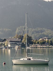 Preview wallpaper boat, lake, houses, village, mountain