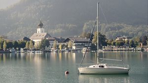 Preview wallpaper boat, lake, houses, village, mountain