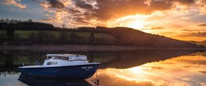 Preview wallpaper boat, lake, sunset, reflection, water