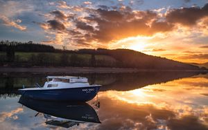 Preview wallpaper boat, lake, sunset, reflection, water