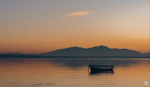 Preview wallpaper boat, lake, sunset, dusk, water
