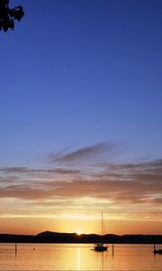 Preview wallpaper boat, lake, sunset, evening, dark