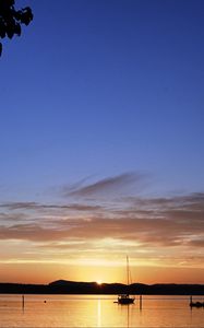 Preview wallpaper boat, lake, sunset, evening, dark