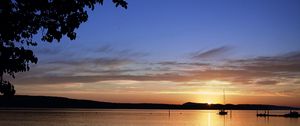 Preview wallpaper boat, lake, sunset, evening, dark