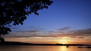Preview wallpaper boat, lake, sunset, evening, dark