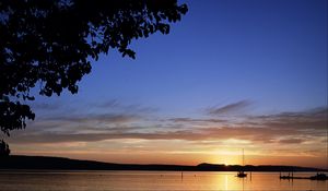 Preview wallpaper boat, lake, sunset, evening, dark