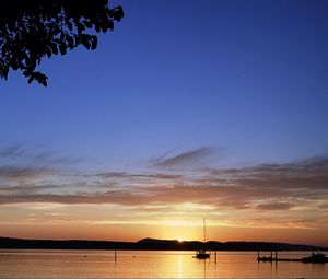 Preview wallpaper boat, lake, sunset, evening, dark