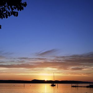 Preview wallpaper boat, lake, sunset, evening, dark