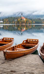 Preview wallpaper boat, lake, trees, buildings, reflection