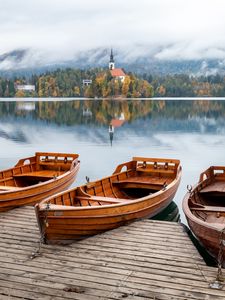 Preview wallpaper boat, lake, trees, buildings, reflection