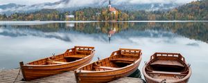 Preview wallpaper boat, lake, trees, buildings, reflection